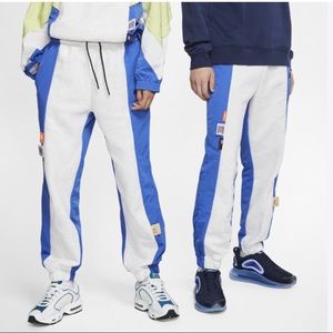 NIKE sportswear icon clash pants. Navy/ Grey